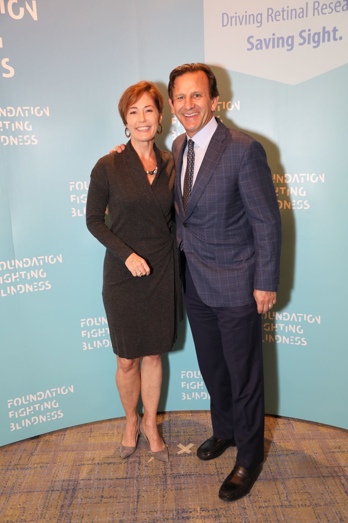 Emily Burch, Visionary Award honoree Chris Zimmerman, President and CEO of Business Operations of the St. Louis Blues